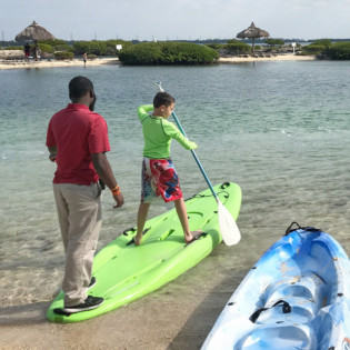 Hawks Cay Resort child paddle boarding 