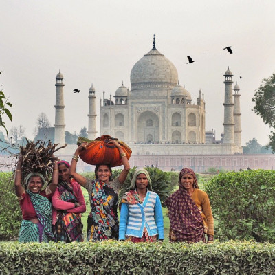Taj Mahal and ladies from across the Yamuna River