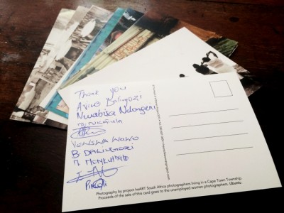 Signed postcards to donors and buyers